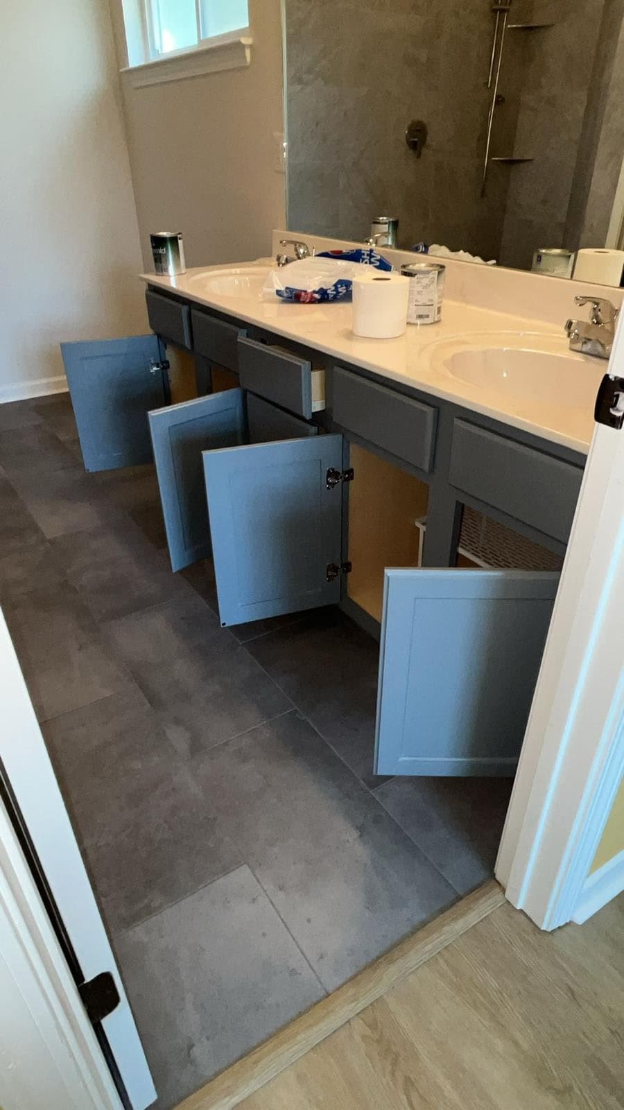 Bathroom vanity cabinets refinished in a sprayed slate-gray finish by Drywall & Remodeling ETC. in Memphis, TN